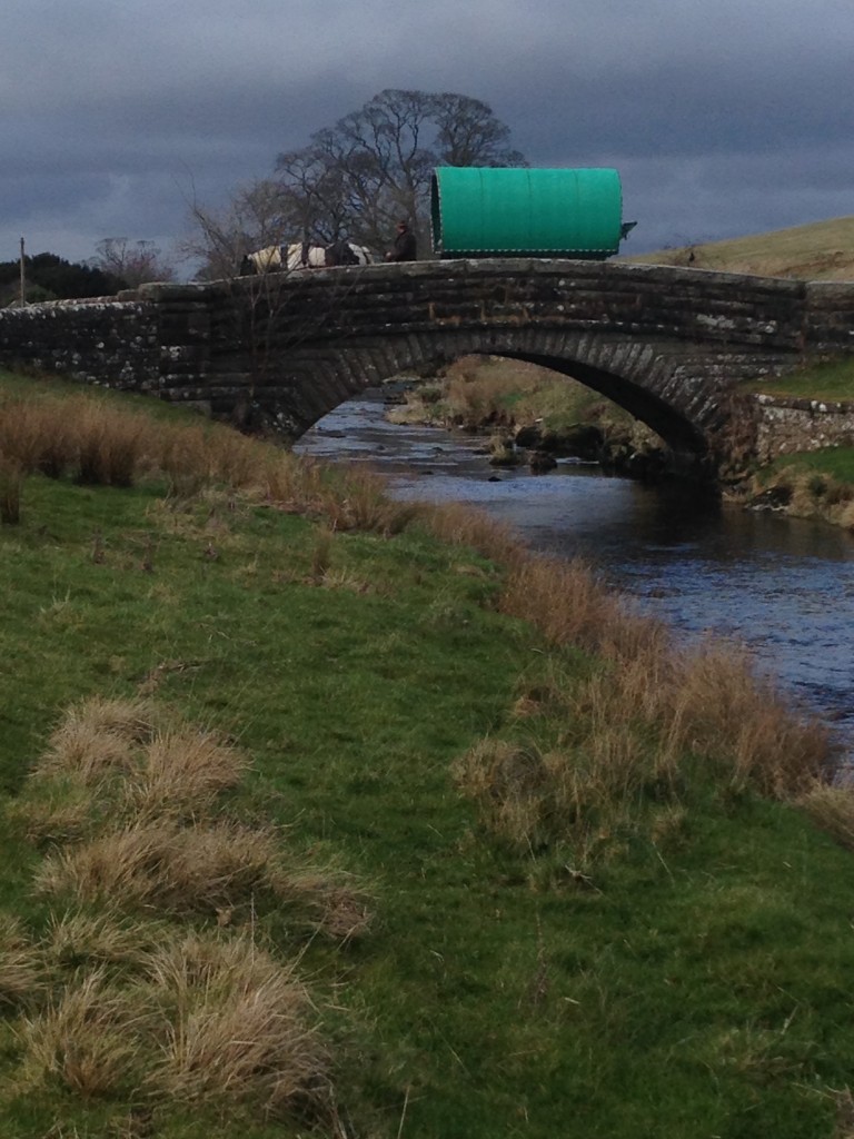 Mat and Outlaw crossing the bridge